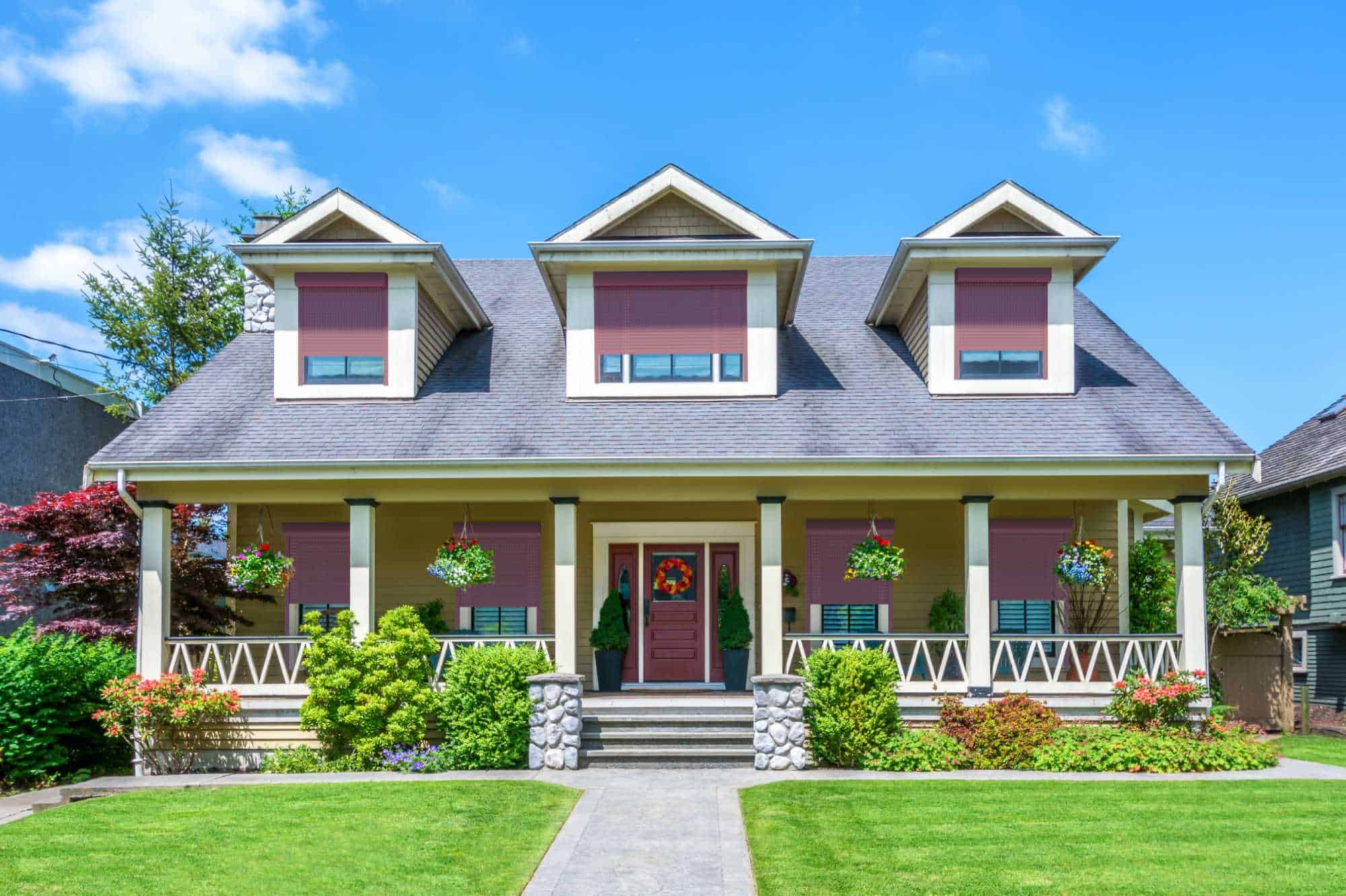 A double storey property with seven roller shutters in the front to protect their privacy