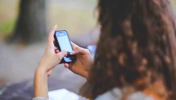 A woman providing customer service support over the phone